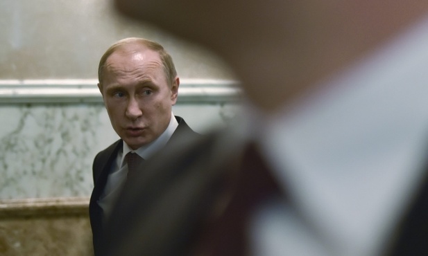 Putin w Mińsku, a jego czołgi na Ukrainie