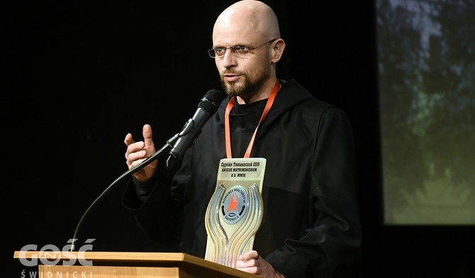 Ojciec Cyprian Tomaszczuk w czasie konferencji na kongresie.