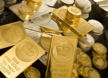 Kadafi zapłaci złotem za ochronę