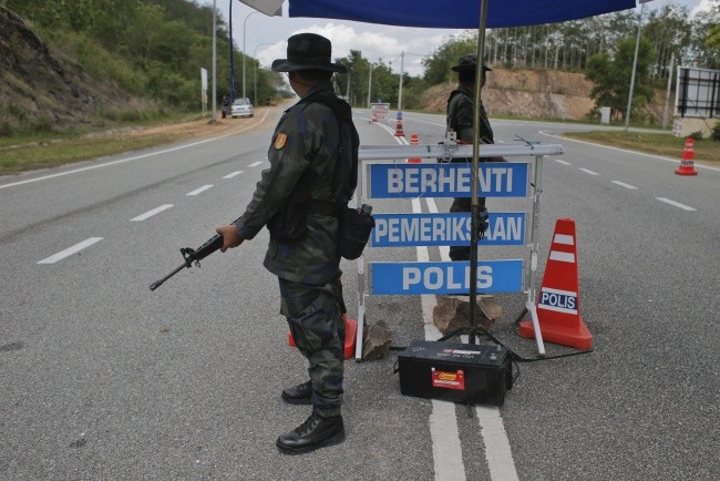 Malezja: Ludzkie szczątki przy granicy