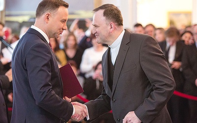 ▲	Prezydent RP Andrzej Duda i ks. prof. dr hab. Jan Kochel. 