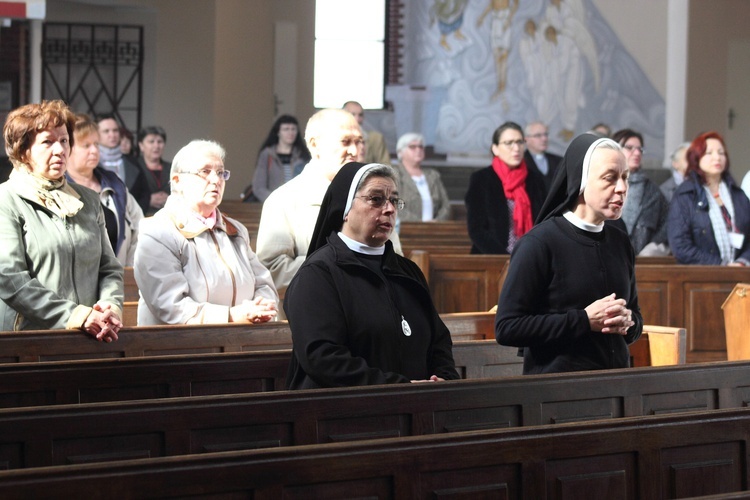 Bibliści przy ołtarzu