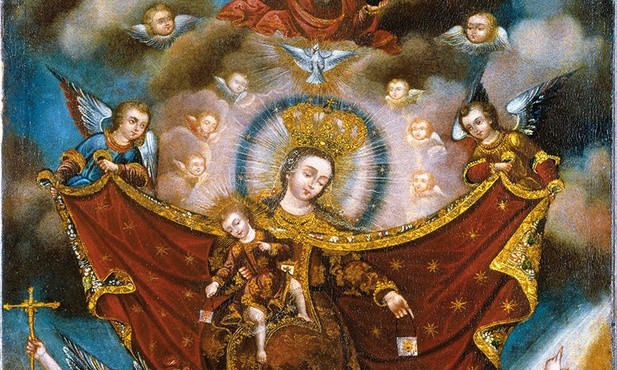 Matka Boża z małym Jezusem nakazują aniołom wyprowadzanie dusz z czyśćca. Chrystus i Jego Matka trzymają w rękach szkaplerze. To znak, że szkaplerz jest drogą do zbawienia. Anioły podtrzymują opiekuńczy płaszcz Maryi, a u góry widzimy Boga Ojca i Ducha Świętego.