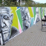 Cukin maluje graffiti wokół hospicjum