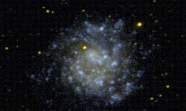 Karłowata galaktyka spiralna NGC 5474 w ultrafiolecie