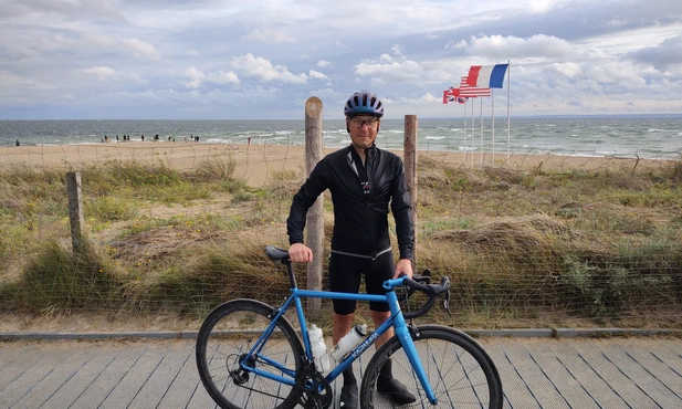 Pastor on bike