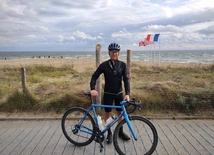 Pastor on bike