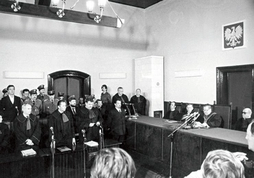 Announcement of the verdict in the trial of those accused of the abduction, torture, and murder of Father Jerzy Popiełuszko. The panel of judges was chaired by Artur Kujawa, the President of the District Court in Toruń. The perpetrators of the crime – Grzegorz Piotrowski, Leszek Pękala, and Waldemar Chmielewski – were sentenced to prison. Adam Pietruszka was sentenced for inciting subordinates to commit the crime.