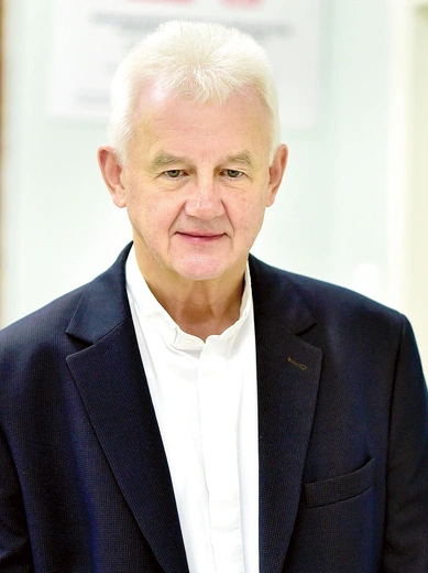 Ksiądz Andrzej Kopiczko, dyrektor Archiwum Archidiecezji Warmińskiej. 