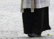 Ksiądz...