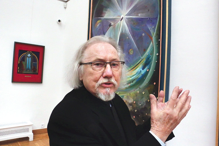 – Sztuka powinna nieść przesłanie duchowe – mówi profesor przy swoim obrazie „Niech stanie się światłość”, wizji stworzenia świata. 