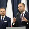 Prezydent RP Karol Nawrocki (P) i szef KPRP Zbigniew Bogucki (L)