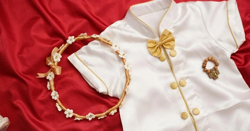 Ubranko do chrztu – na co zwrócić uwagę przy wyborze stroju dla dziecka?